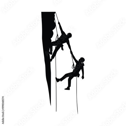 Two climbers helping each other while scaling a steep rock face