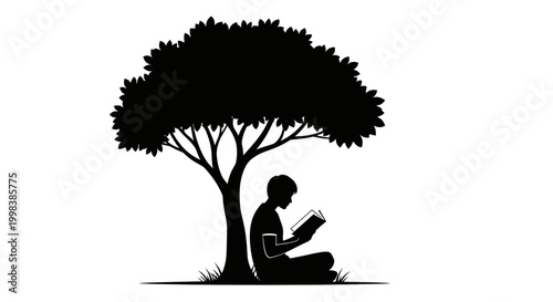 Man reading book under tree silhouette