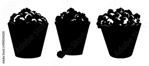 Popcorn set with black silhouettes on white background featuring snack, movie theater, buttery treat with white and popcorn kernels
