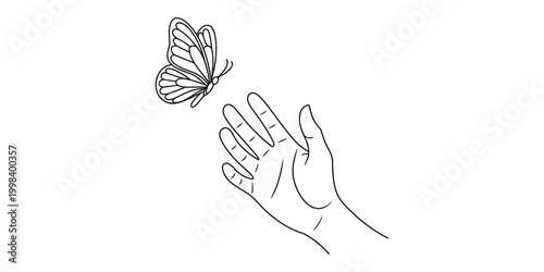 A butterfly flying away from an open human hand