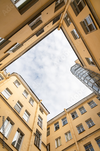 Courtyard view in a Saint Petersburg residence under cloudy skies