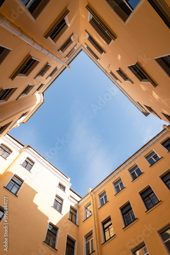 Building courtyard in Saint Petersburg with view of the sky and walls
