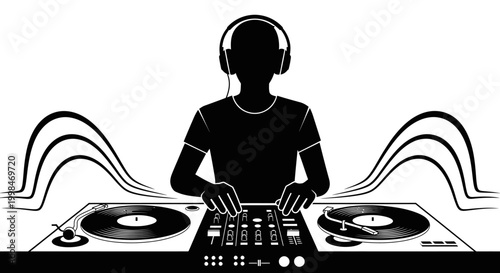 Silhouette of a dj using turntables and equipment with headphones on