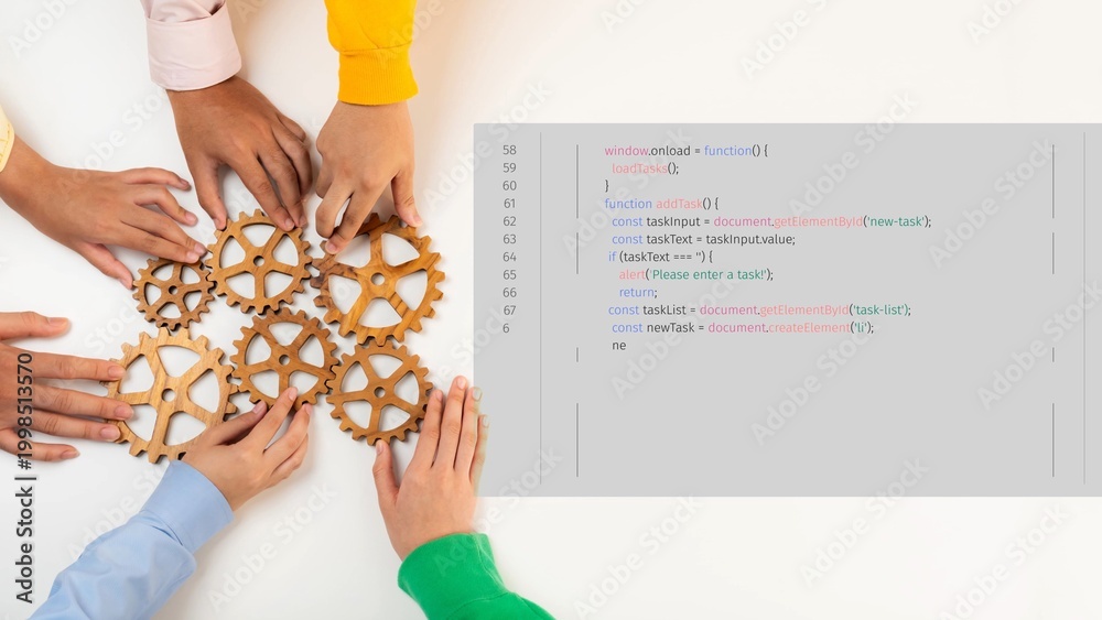 Obraz premium A close-up of diverse hands working together with wooden gears and coding elements, showcasing collaboration and innovation in a business or technology environment. Raster