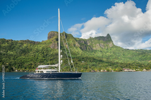 Photos Beautiful sailing superyacht at anchor in the Cook's Bay in the tropical island