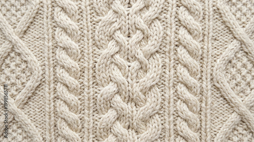 Macro of Cream Aran Cable Knit with Braided Rope Cable Pattern