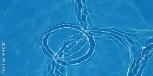 Clear blue water surface with ripples and circular waves from rain drops