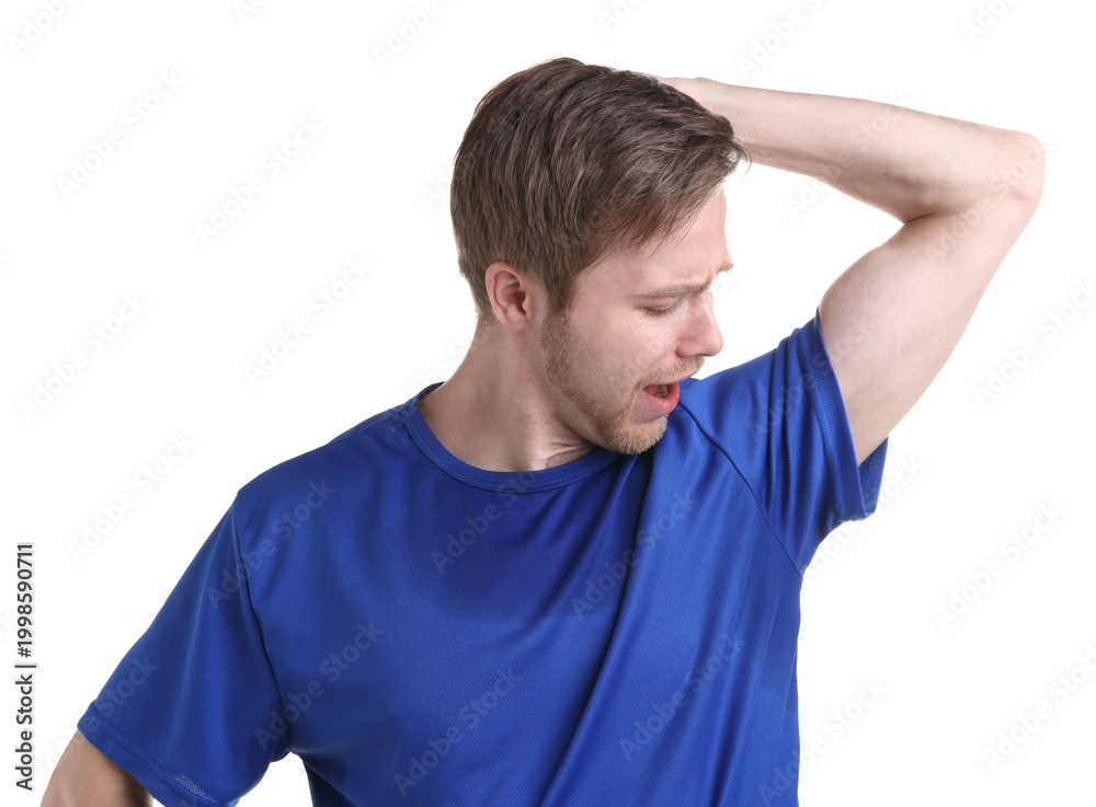 Obraz premium Man suffering from sweating on white background