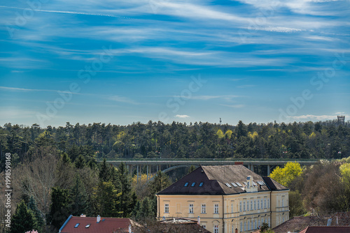 фотографія Cityscape with bridge and historic buildings under blue sky in Veszprem