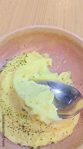 Spoon scooping up creamy mashed potato, Fluffly Vegetarian Appetizer, Rustic Meal, Lunch Dinner Side Dish, Slow Motion