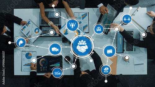 Cuadro en lienzo A diverse group of professionals collaborating on digital marketing strategies, surrounded by charts and analytics, showcasing teamwork and data-driven decision-making