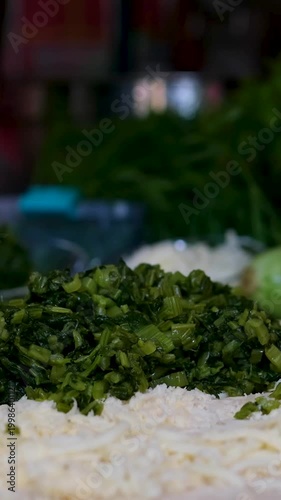 To prepare lavash with spinach and cheese, sprinkle boiled frozen spinach on the lavash.