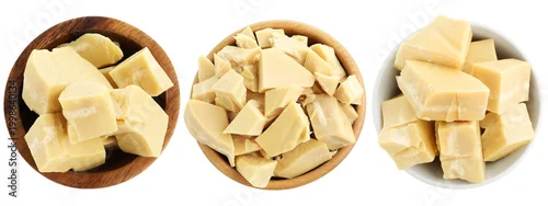 Panel kuchenny z motywem Cocoa butter pieces in bowls isolated on white, set. Top view