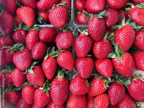 Fresh ripe strawberries in close-up macro composition