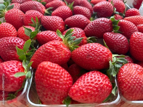 Fresh ripe strawberries in close-up macro composition