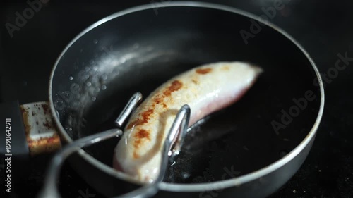 Large Sausage Turned Over In Hot Pan