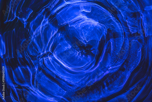 Abstract background with bokeh defocused lights and shadow. Waves in the stellar lagoon. Interstellar clouds.