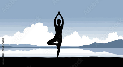 Silhouette of person in tree pose on land before calm water and mountains