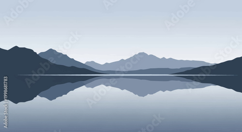 Serene mountain range reflected across a still, blue lake under a pale sky