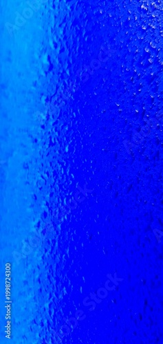 Abstract blue water texture with bubbles and droplets, gradient liquid background, macro underwater surface ideal for design, technology, and creative projects