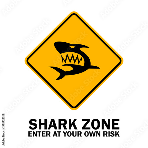 Fotografie A yellow warning sign with a shark icon and the text “Shark Zone, Enter at Your