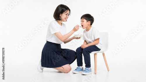 Mother Feeding Son With Love