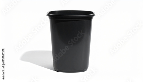 Black rectangular plastic waste bin with rounded corners on a white background