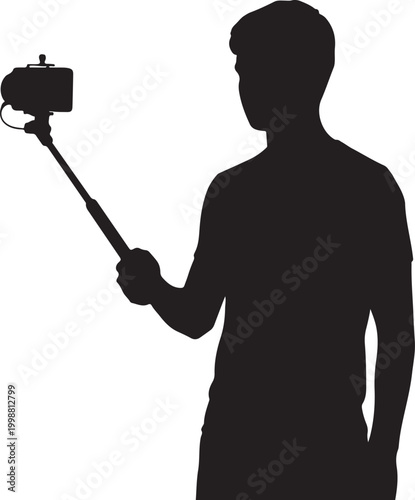 Silhouette of a man taking a selfie with a smartphone on a selfie stick