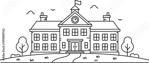 Large school building with a clock on the front