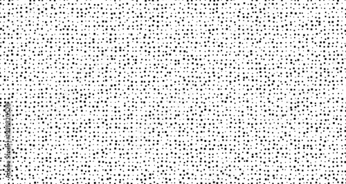 Black dots scattered on white background pattern