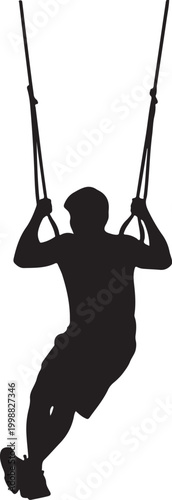 Silhouette of a Male Athlete Training on Gymnastic Rings