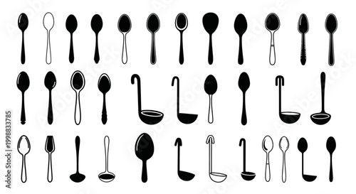 Collection of various spoons and ladles in different styles and sizes, showcasing kitchen utensils.