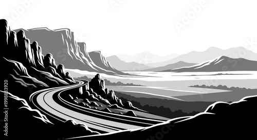 Winding mountain road through a dramatic, stark landscape.