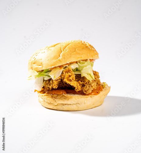 Fried chicken burger on a white background.