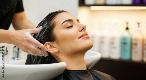 Relaxed Woman Enjoying Hair Wash at Salon Spa.