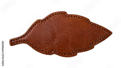 Stitched brown leaf shaped leather craft piece with natural texture isolated on transparent white background