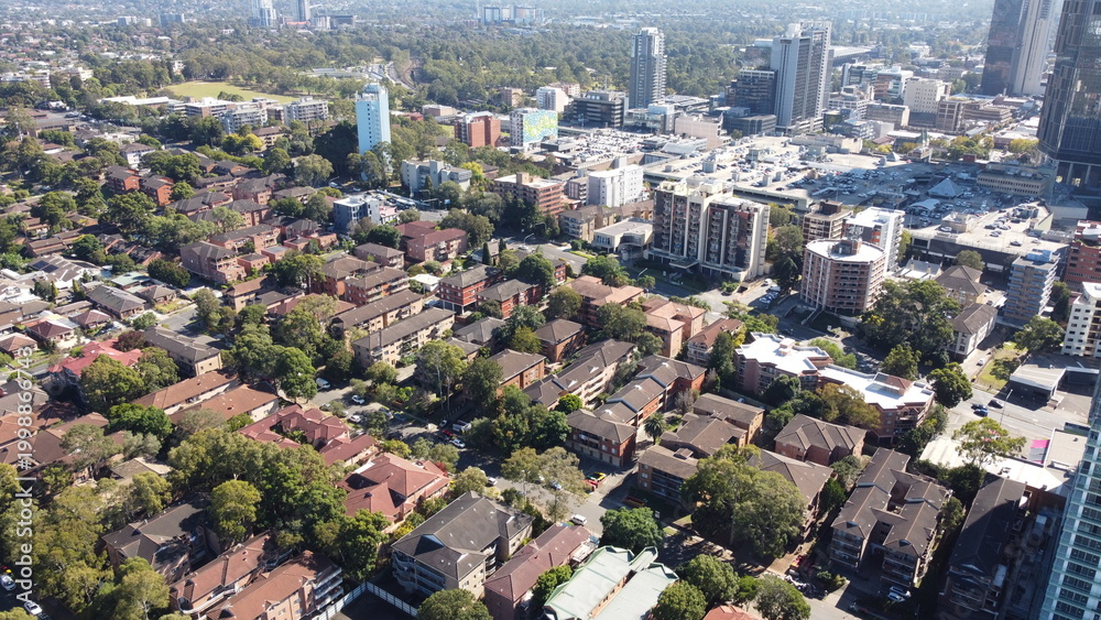 Obraz premium New apartment and office towers under construction driving growth & development
