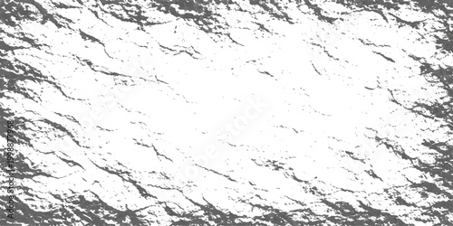 Textured grayscale surface with rugged, irregular patterns. Emphasizing the play of light and shadow, the image invites a tactile exploration of texture and form. 