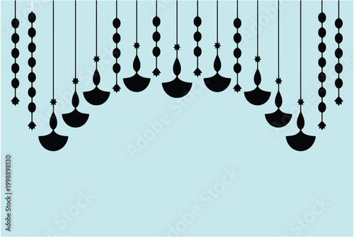 Decorative hanging diya lamps and marigold flower garlands for diwali festival celebration
