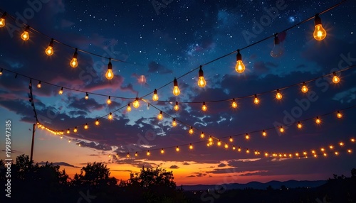 Decorative string lights glowing under a starry night sky with colorful sunset clouds