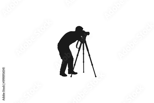 Photographer with Camera on Tripod Silhouette