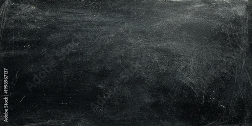 Dark wall  scratched blackboard texture background with white chalk marks and smudges for design and education concepts