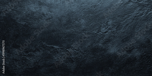 Dark wall slate stone texture background with rough surface and blue undertones for design and decoration