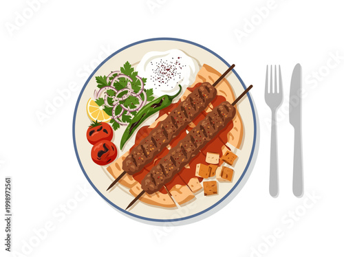 Delicious Traditional Turkish Iskender Kebab Platter with Yogurt and Vegetables.