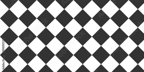 Harlequin seamless pattern. Geometric background with with black and white rhombus. Circus or masquerade ornament. Vector flat illustration.Eps10