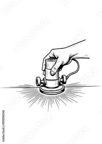 Hand using a sander tool on a work surface