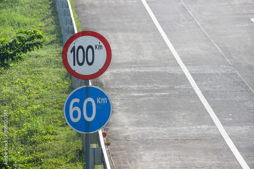 Fotografie Traffic signs showing maximum and minimum speed limits on toll roads
