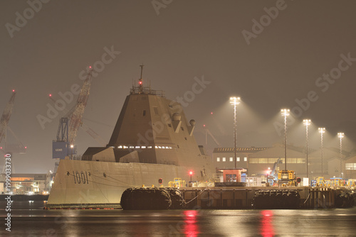 United States Navy USS Michael Monsoor (DDG-1001), Zumwalt-class guided-missile destroyer moored at Yokosuka Port, Tokyo, Japan at night