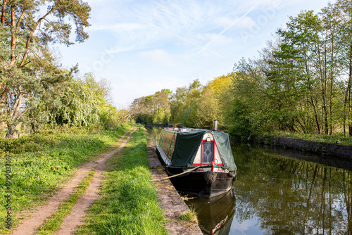 Narrow boat on canal in the countryside