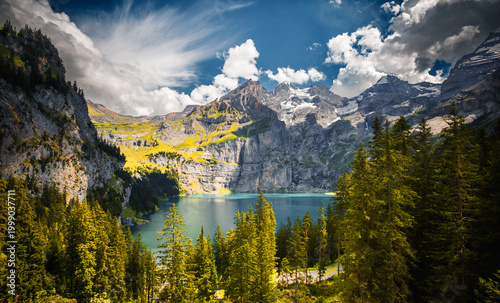 Tablou pe pânză The most gorgeous Swiss lake Oeschinensee surrounded by grand mountains